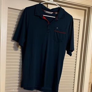 Travis Mathew Navy Polo with Red Accents